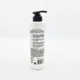 White pump bottle labeled Hair Fall Control Biotin  Ginseng Root Shampoo on a white background