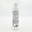 White pump bottle for hair conditioner labeled Hair Fall Control Biotin  Ginseng Root Conditioner on a white background