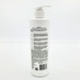 White plastic pump bottle of Keratin Biotin  Keratin Conditioner on a white background label visible with text lines