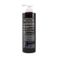 Dark brown pump bottle of Herbal Scalp Care Conditioning Treatment seen from the side showing back label details haircare product